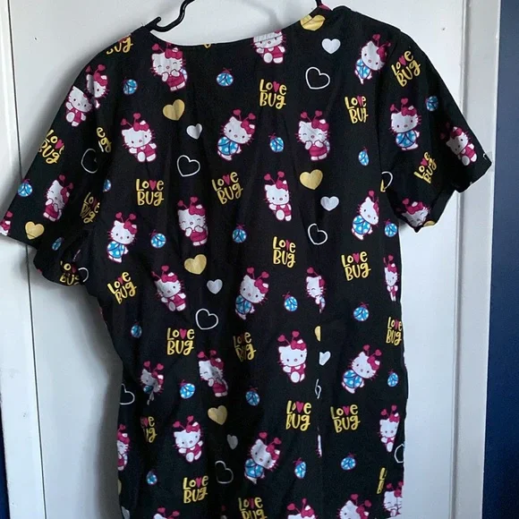 Sanrio Hello Kitty Women’s Scrub Top, Black & Multicolored w/ Pockets, Large SS - Picture 7 of 7